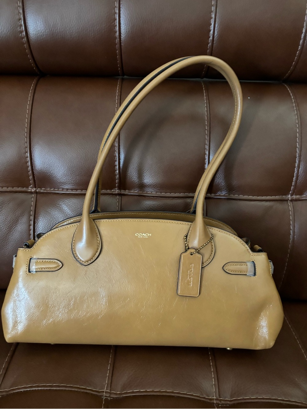 The Coach Empire Carryall 34 in Honey NWT and dust bag